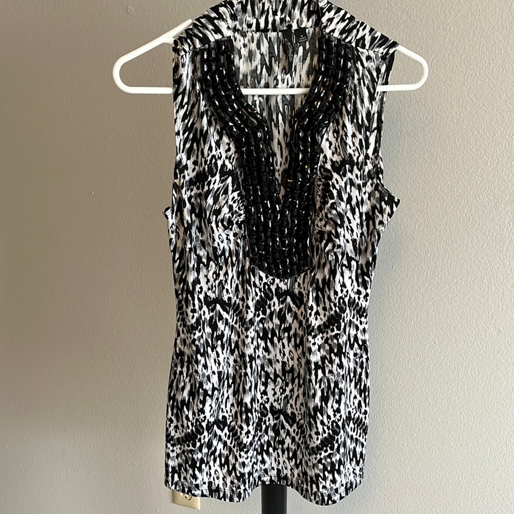 Polyester, 5 %spandex, beading on neckline